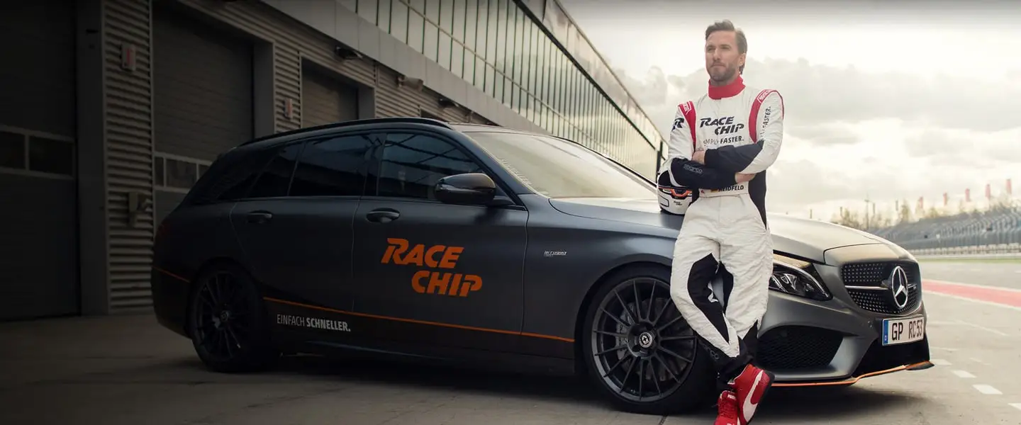 RaceChip driver and car at a racing circuit